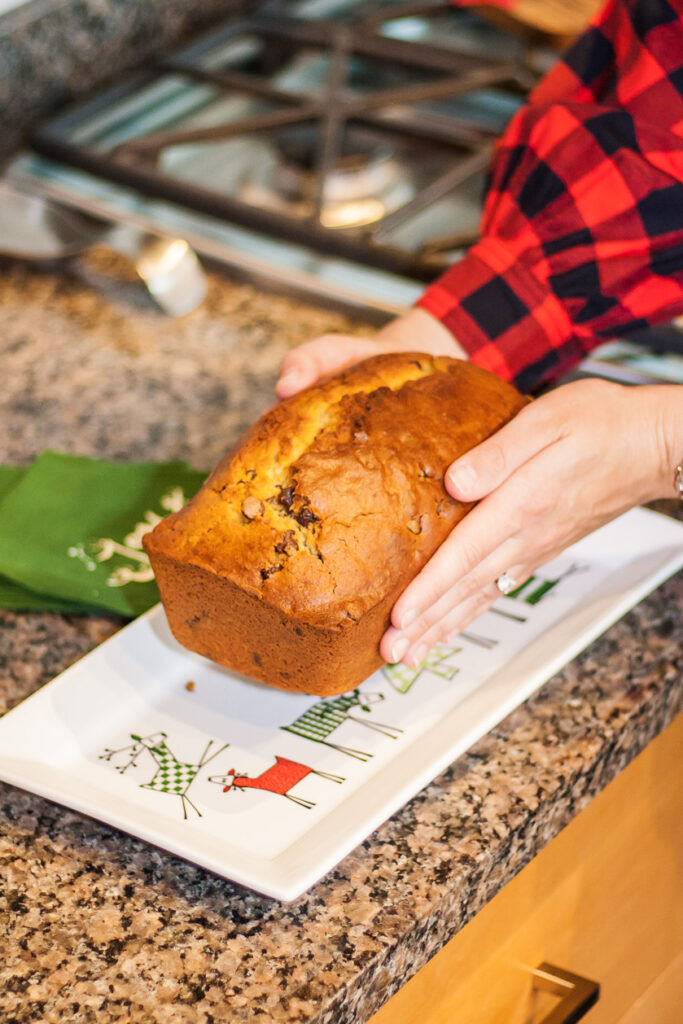 person holding a bread 