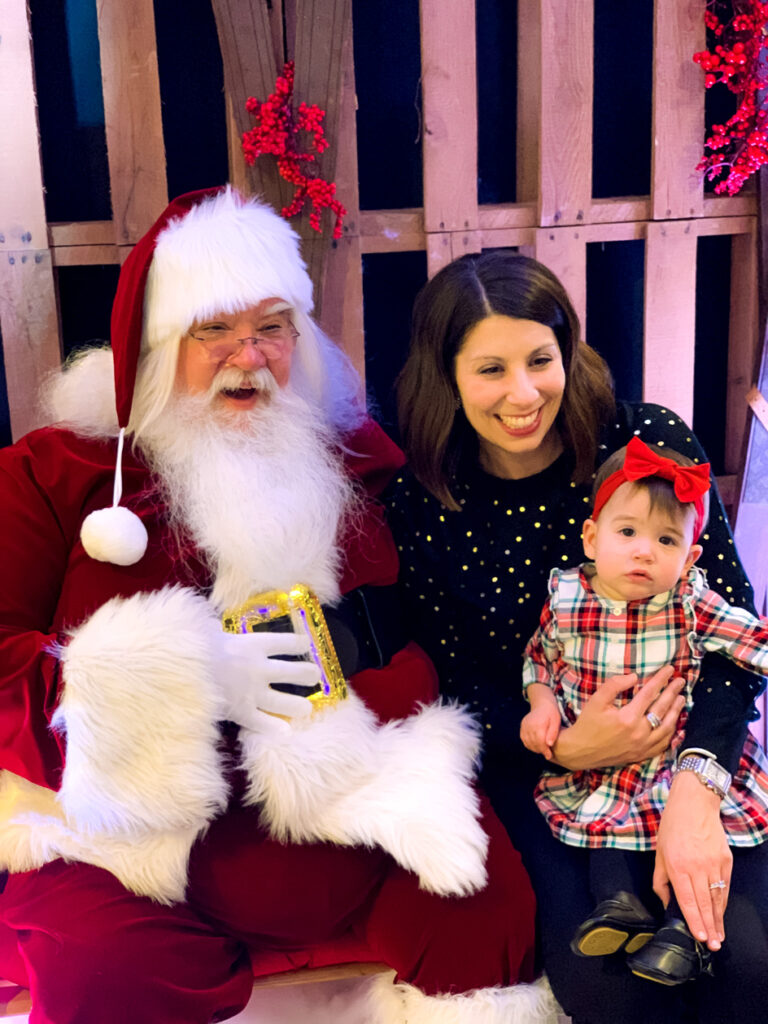 photo of mom and child with Santa for Christmas Traditions Chicago Style